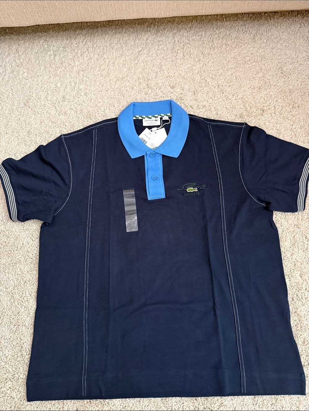 Lacoste Men’s Navy Polo with Light Blue Collar